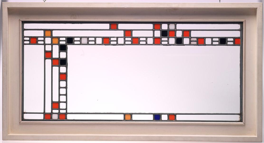 Stained glass panel by Frank Lloyd Wright Designed in 1912 for the Avery Coonley Playhouse,  Clear and coloured glass, lead latticing, wood 2000.22.3   Gift of the Louise Hawley Stone Charitable Trust; Purchased by the ROM with the assistance of a Moveable Cultural Property grant accorded by the Minister of Canadian Heritage under the terms of the Cultural Property Export and Import Act. 