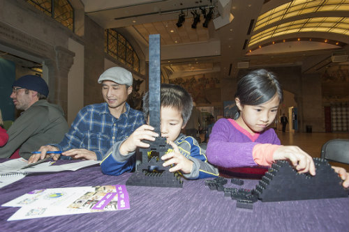 Families building lego at the ROM