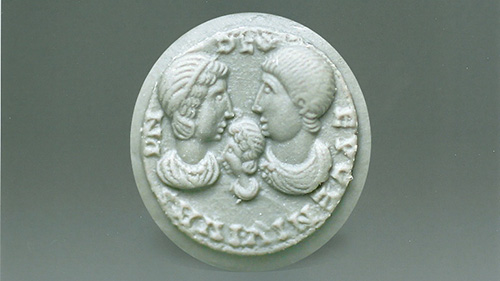 Portraits depicted on seal are embossed on the clay impression.