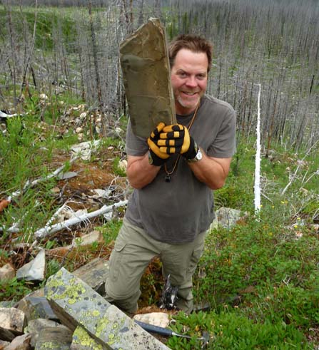 Robert Gaines discovers fossils along the rocky talus slope.