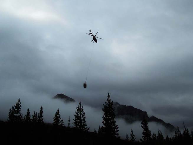 Helicopter transport of equipment in nets to the campsite (image courtesy of Gabriela Mangano)