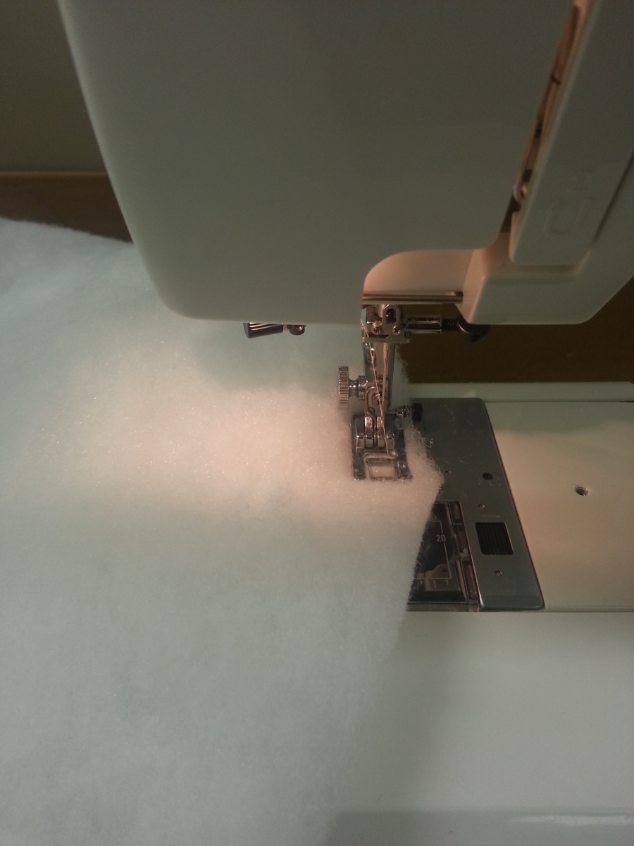 Photo of a sewing machine in action