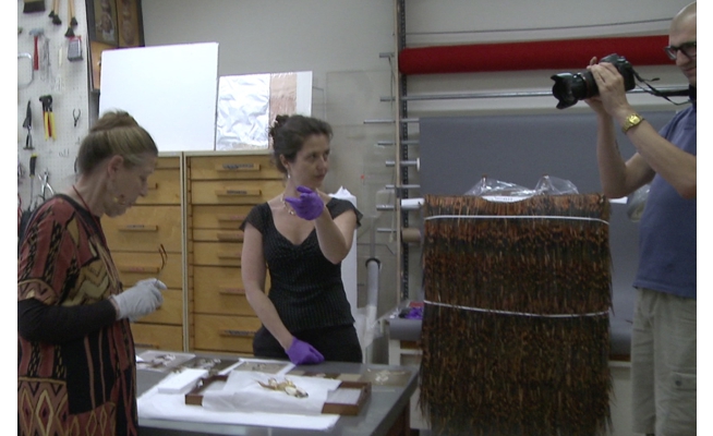 Julia Fenn and Kate being filmed by Zak Rogers in the ROM Conservation department