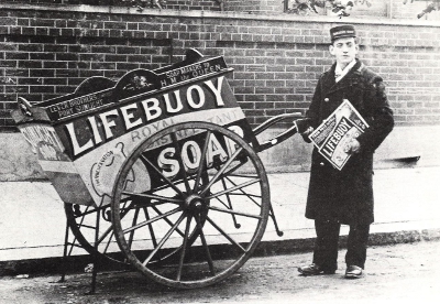 An archival photo of a man pulling a Lifebuoy Soap cart. Again no mention of its whale fat origins. Image credit - W.J. Reader