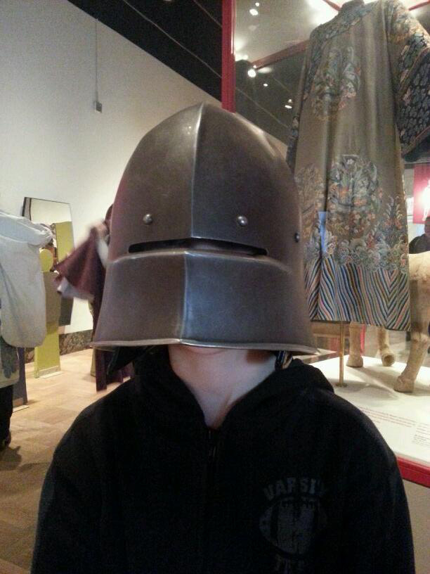 Families and kids can try on costumes in the CIBD Discovery Gallery, like this medieval knight's helmet.