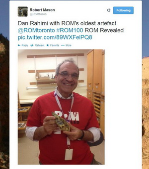 ROM100 Celebration Twitter picture of Dan Rahimi holding the Rom's oldest artefact