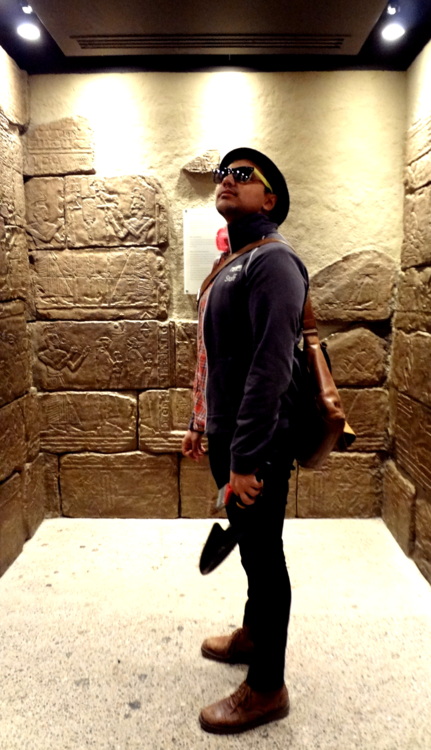 Standing in a replica of a tomb in the Gallery of Africa: Egypt.