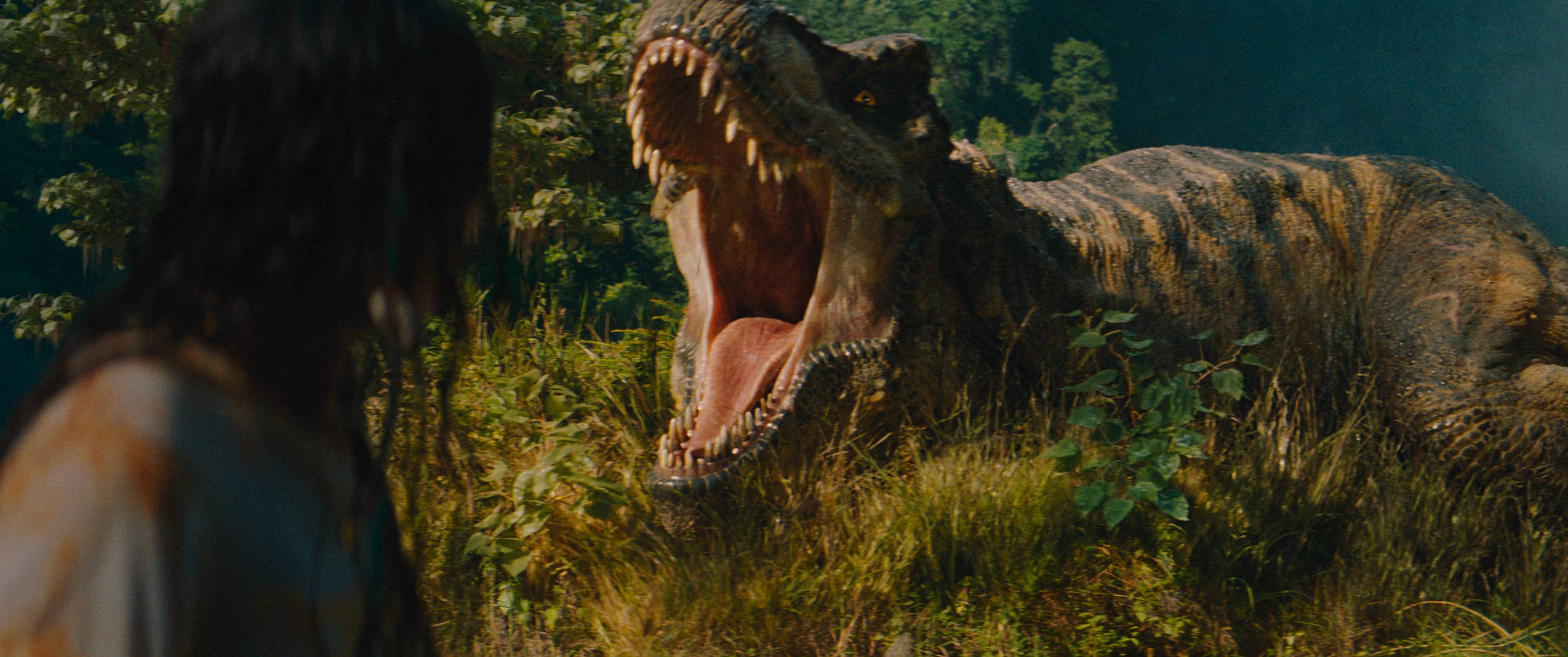 Woman looks behind her to see a giant dinosaur