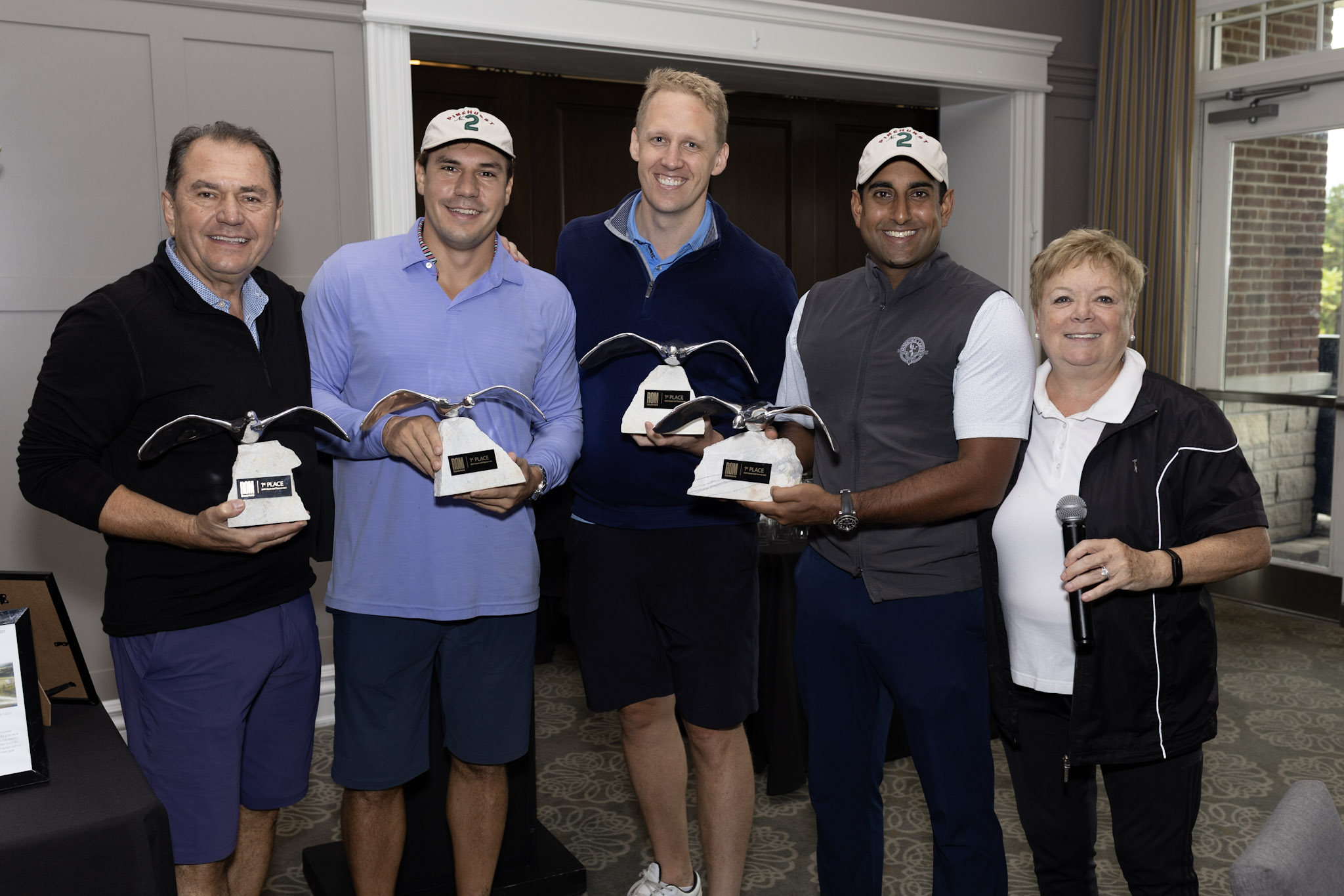 Foursome 1st place trophy winners