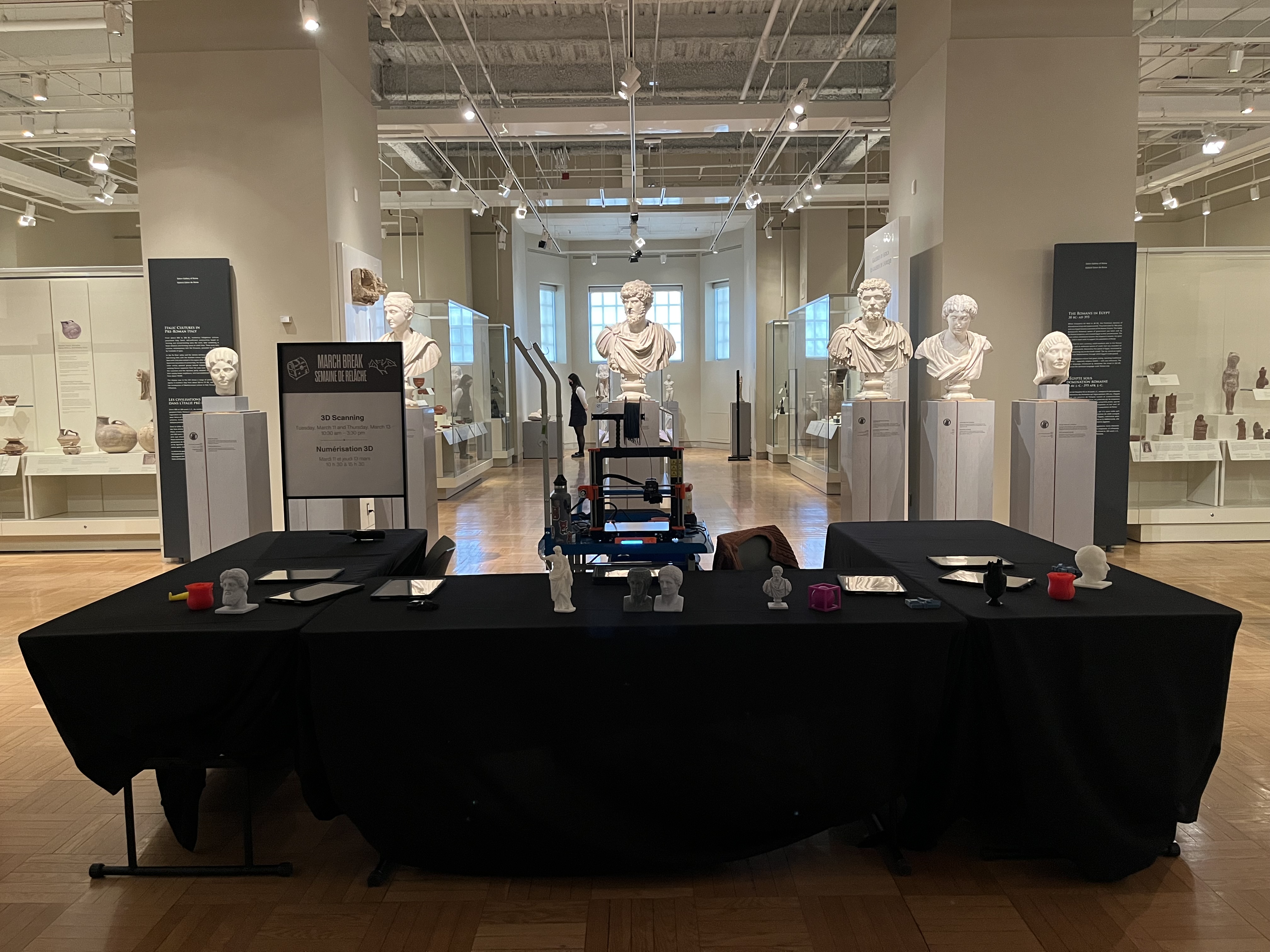 A table set up in a museum gallery holding technical instruments