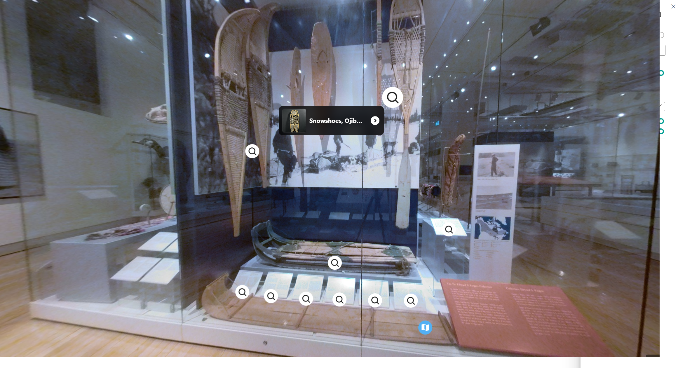 A case in a museum gallery filled with three pairs of snowshoes of differing sizes, two different styles of sled, and images of Indigenous peoples in snowy environments using what’s inside the case.