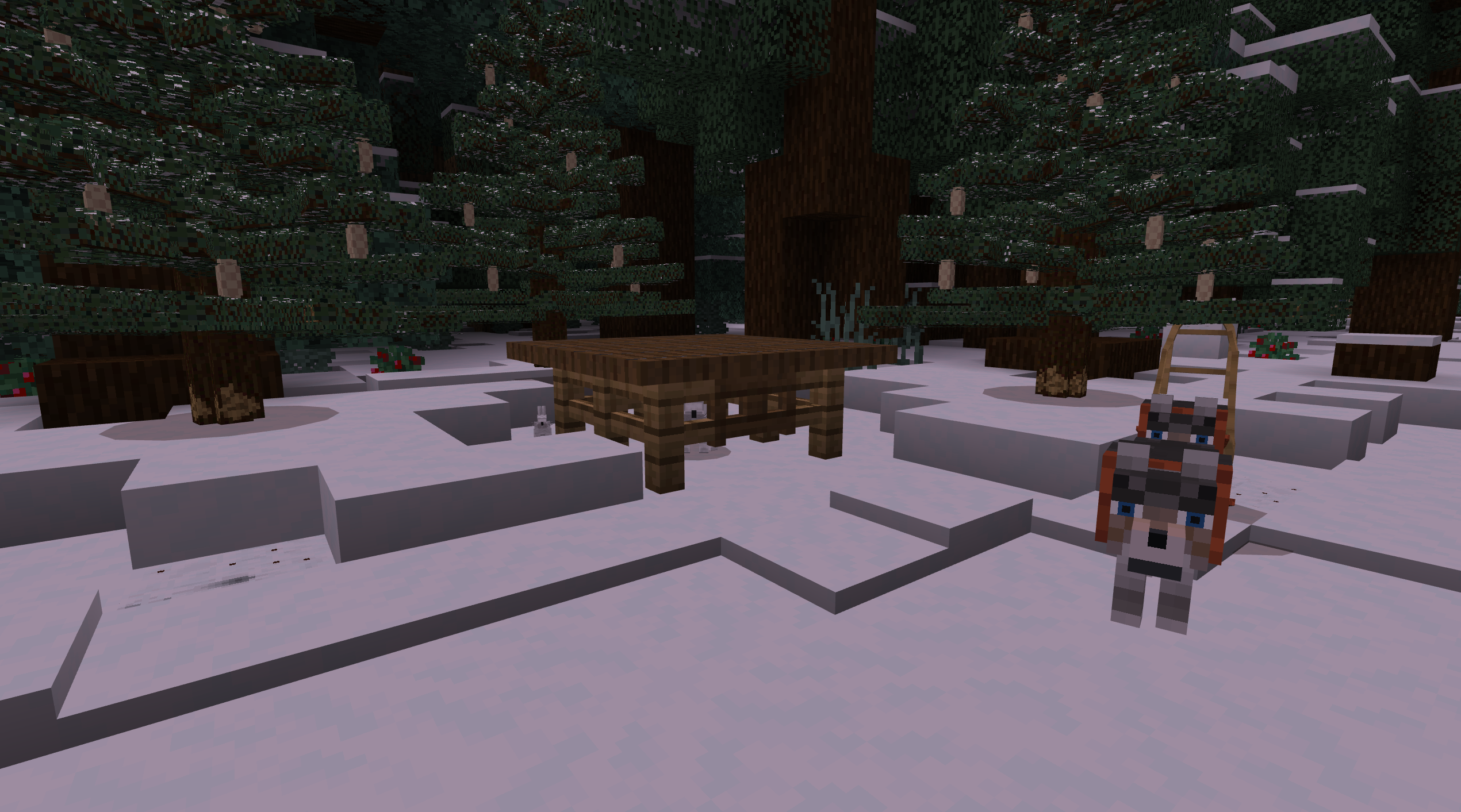 A Minecraft screenshot of a trap in a winter forest containing a white rabbit. On one side of the trap is a smaller white rabbit, and on the other is a dogsled.