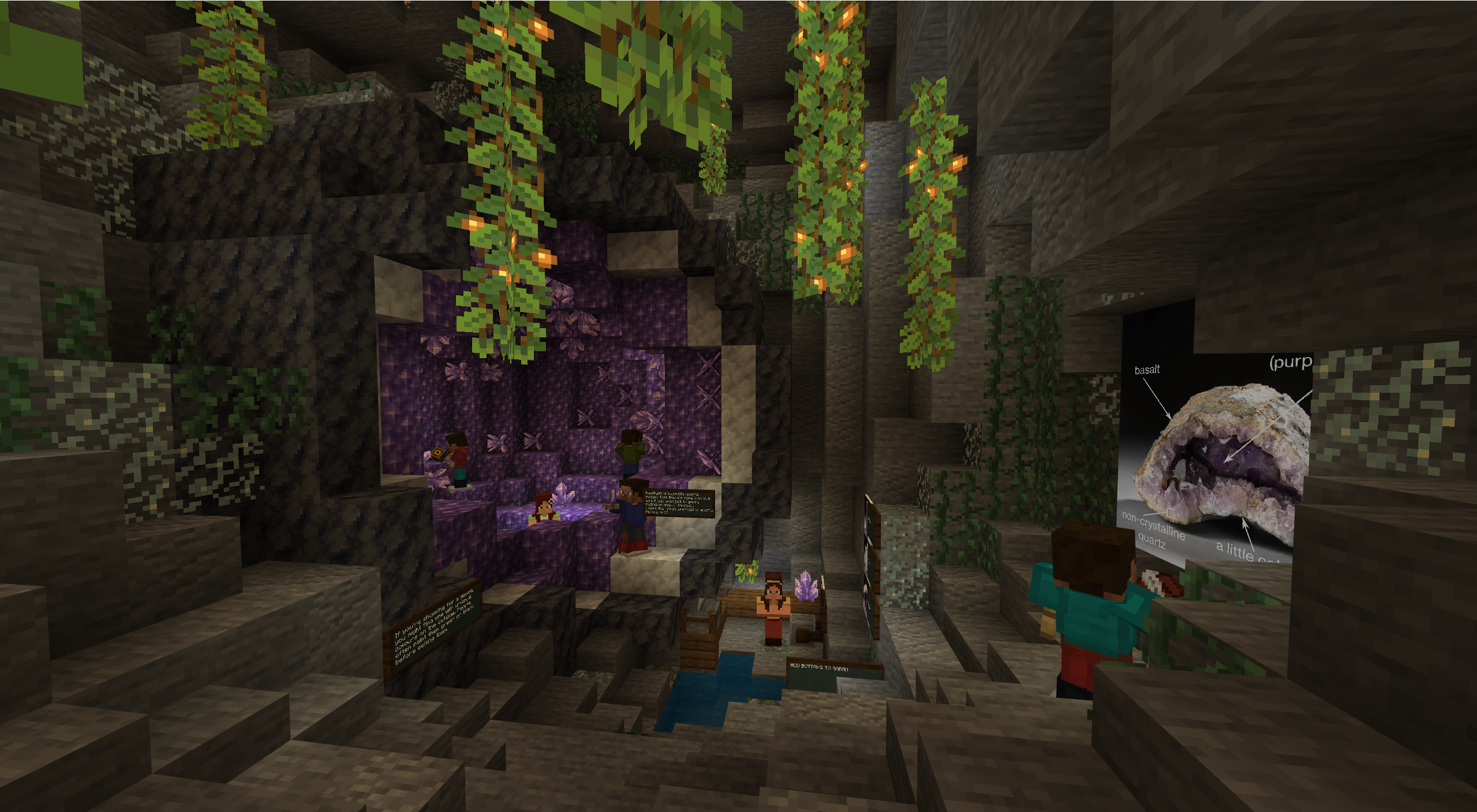 A Minecraft screenshot of a large amethyst and calcite geode. Small Minecraft characters walk around the geode, and a large labelled poster of a real geode is on the wall.