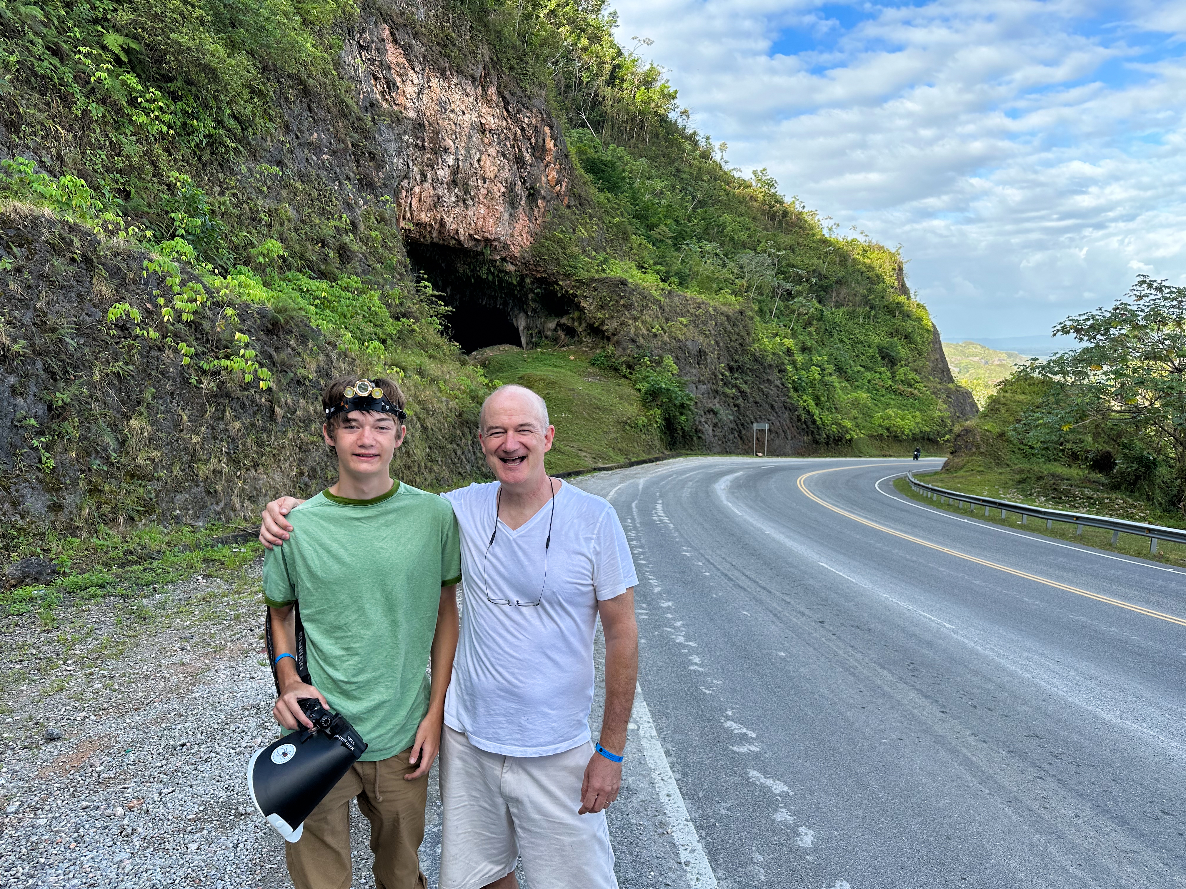 Beckett Robertson and his father, Blair, pose outside the Cueva Boulevard del Atlántico. (2023)