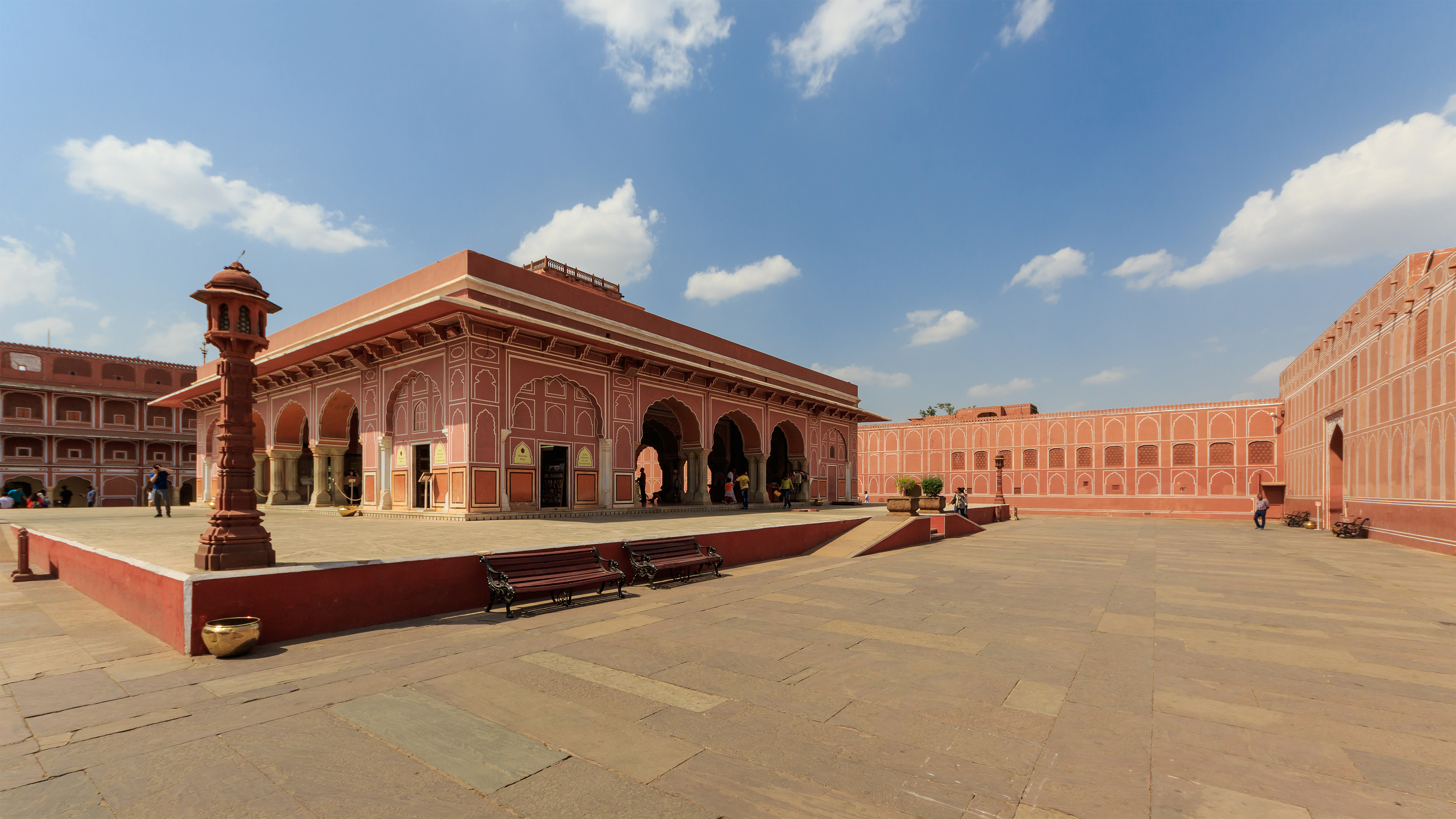 A building with arches in a courtyard