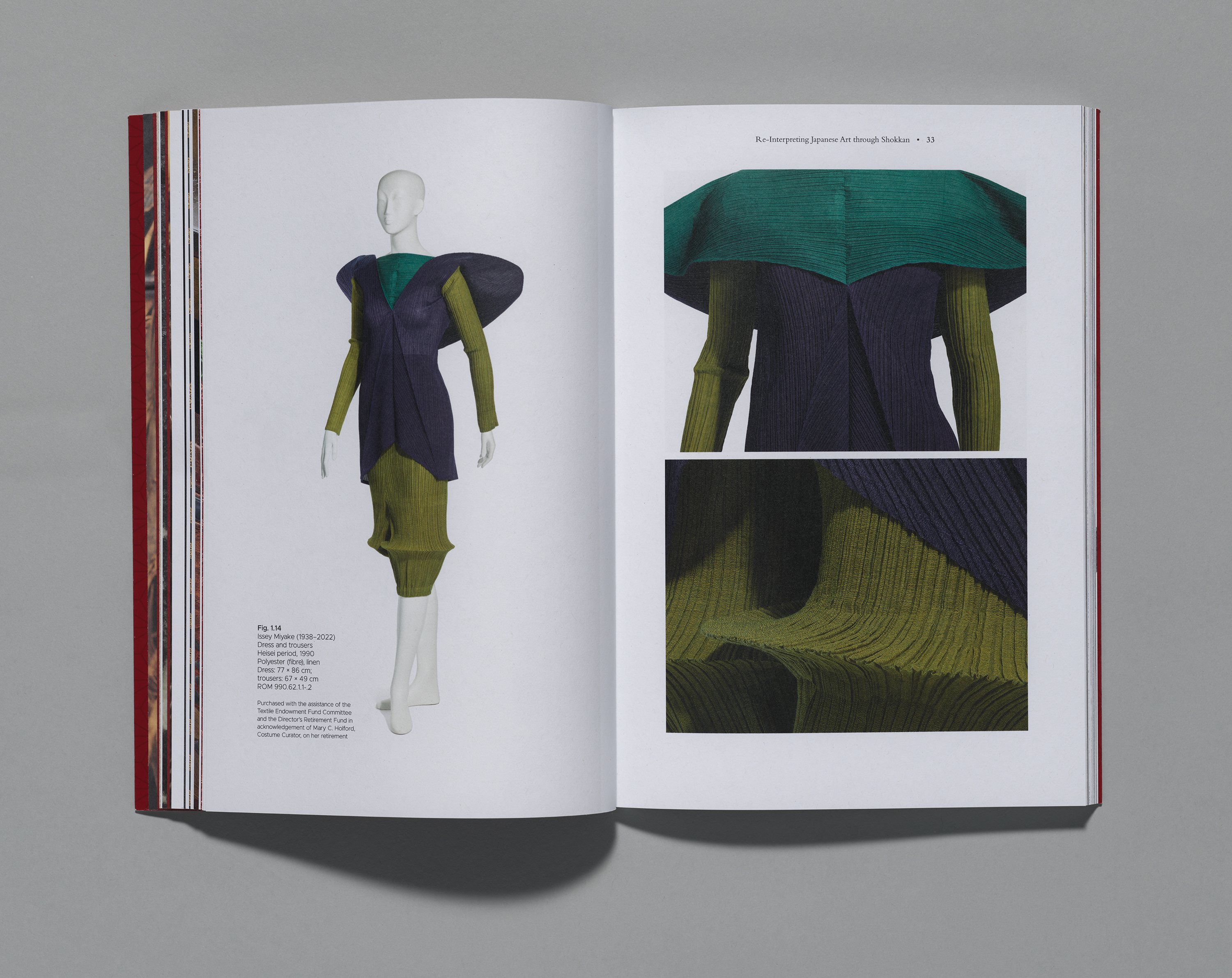 An open book spread featuring a textured, layered garment on a white mannequin, with close-up fabric details shown on the opposite page.