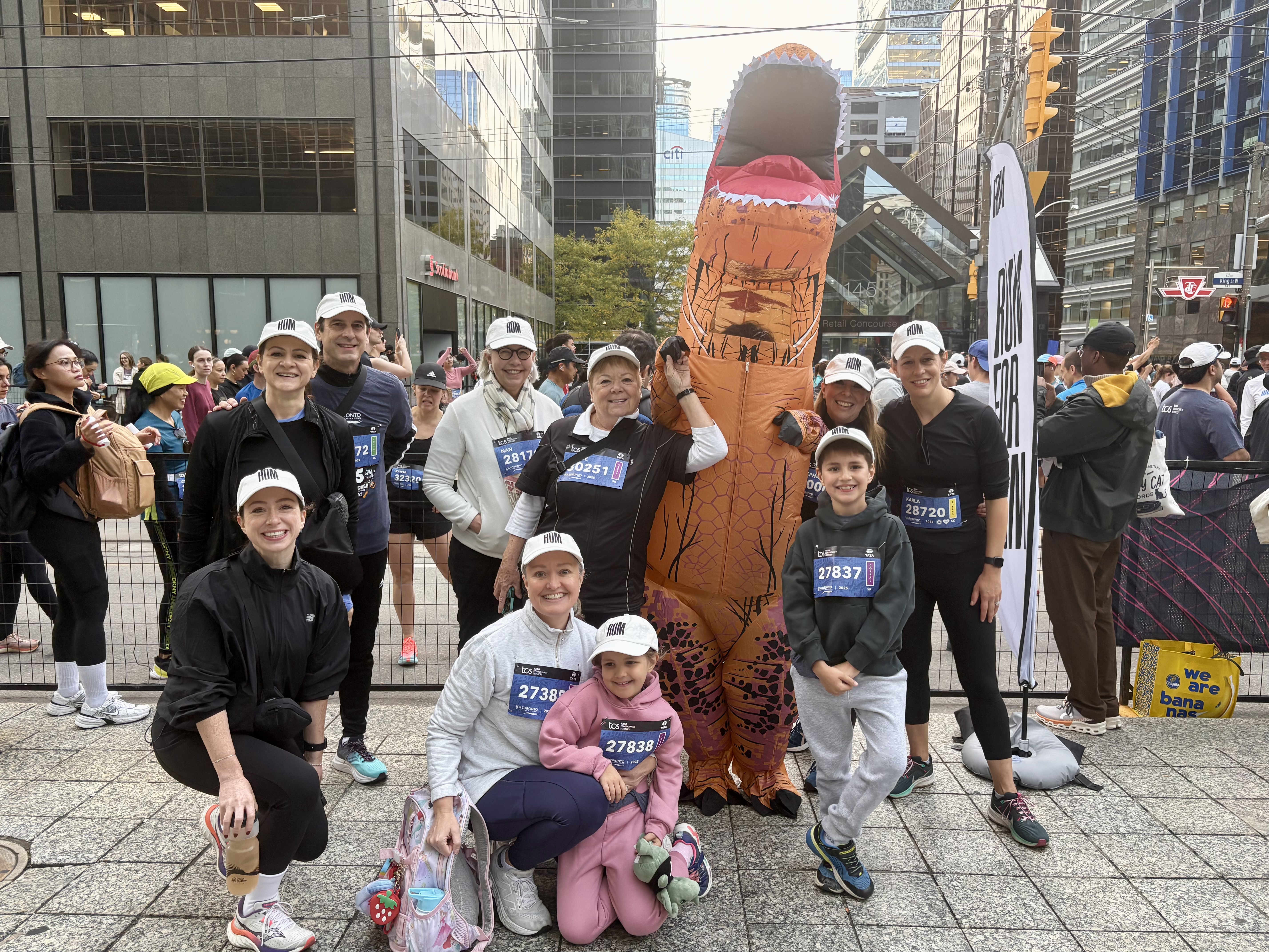 ROM Governors Foundation team in a photo with the Run for ROM mascot. 