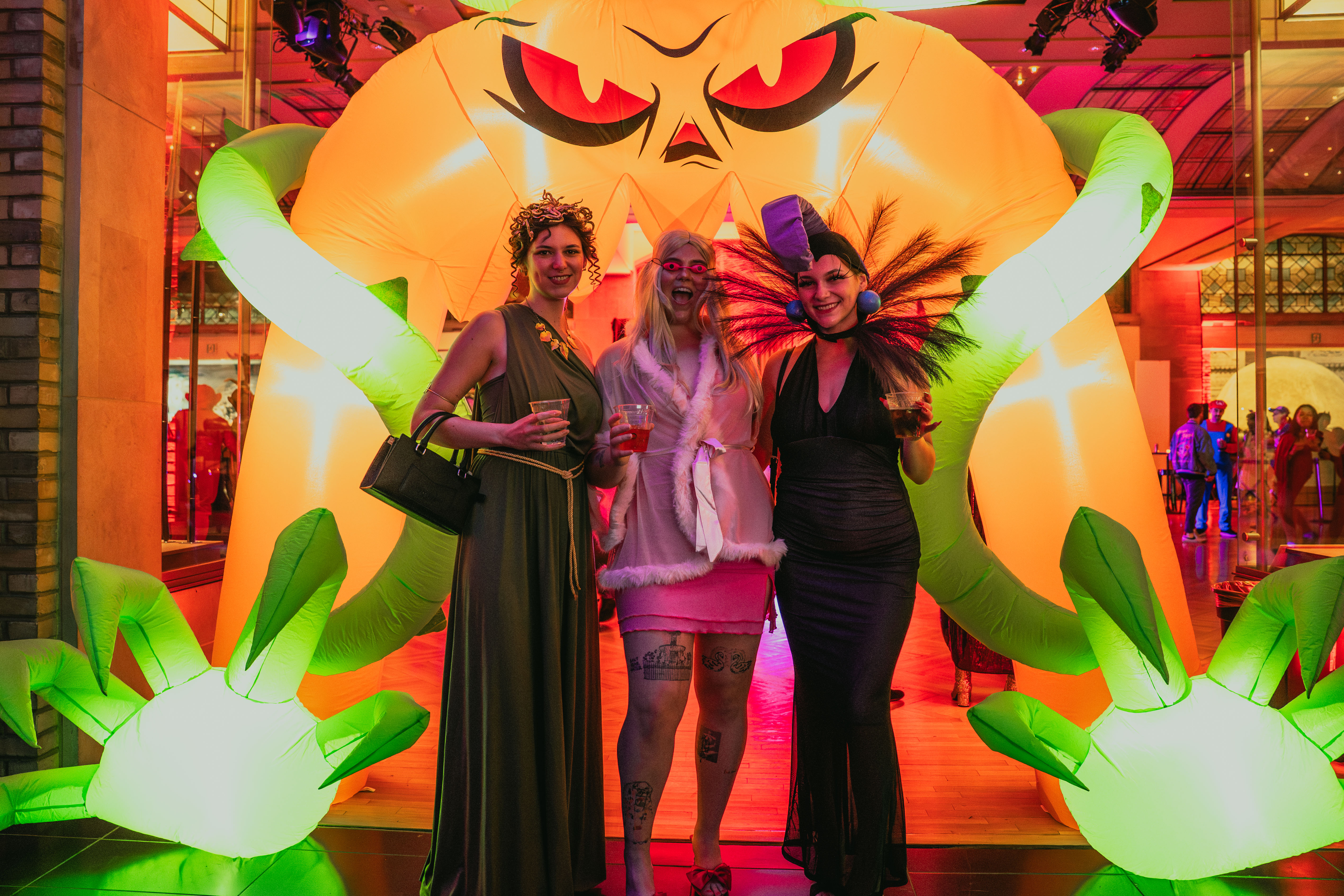 image of 3 women in front of inflatable at RAD 
