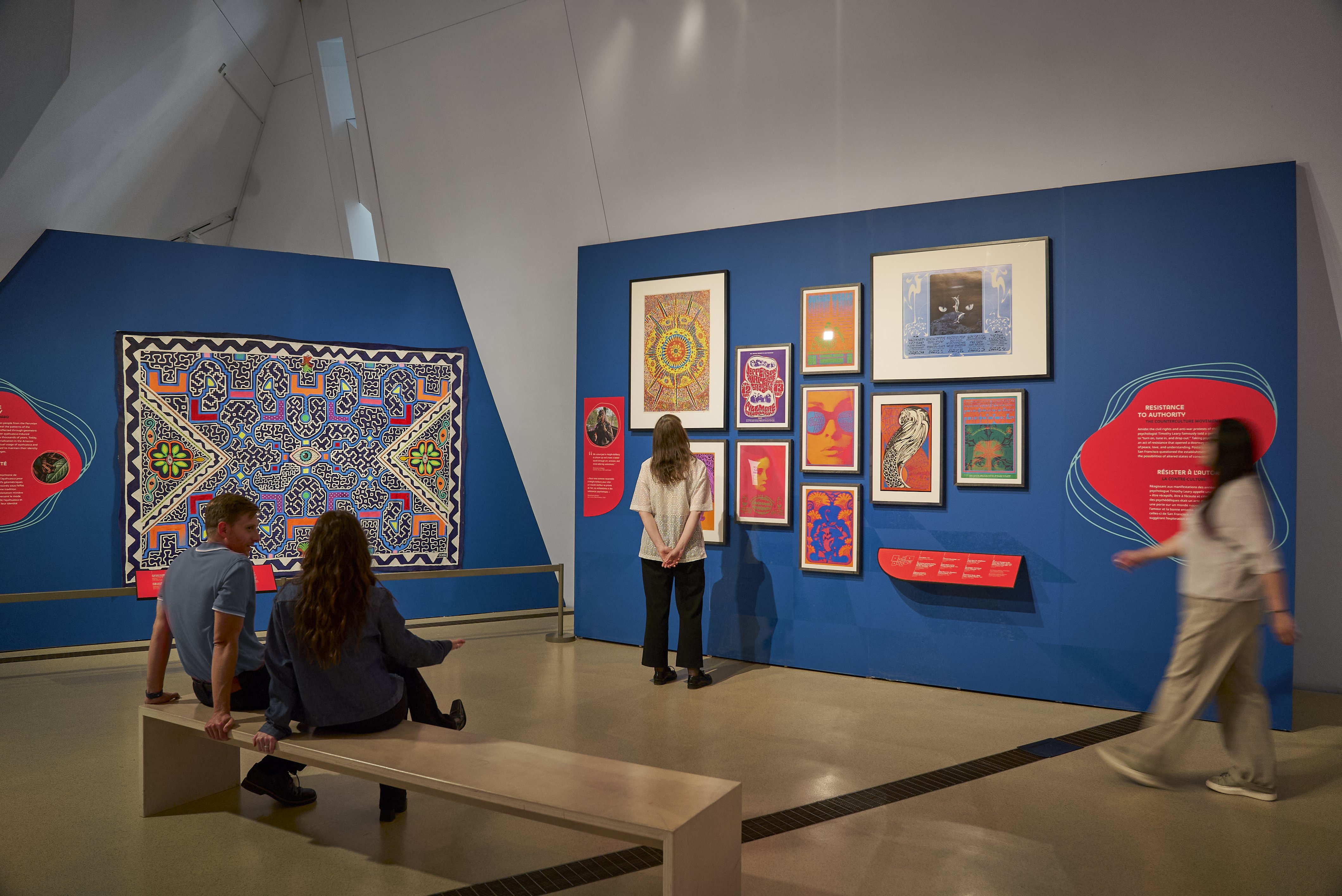 image of four people inside exhibition space