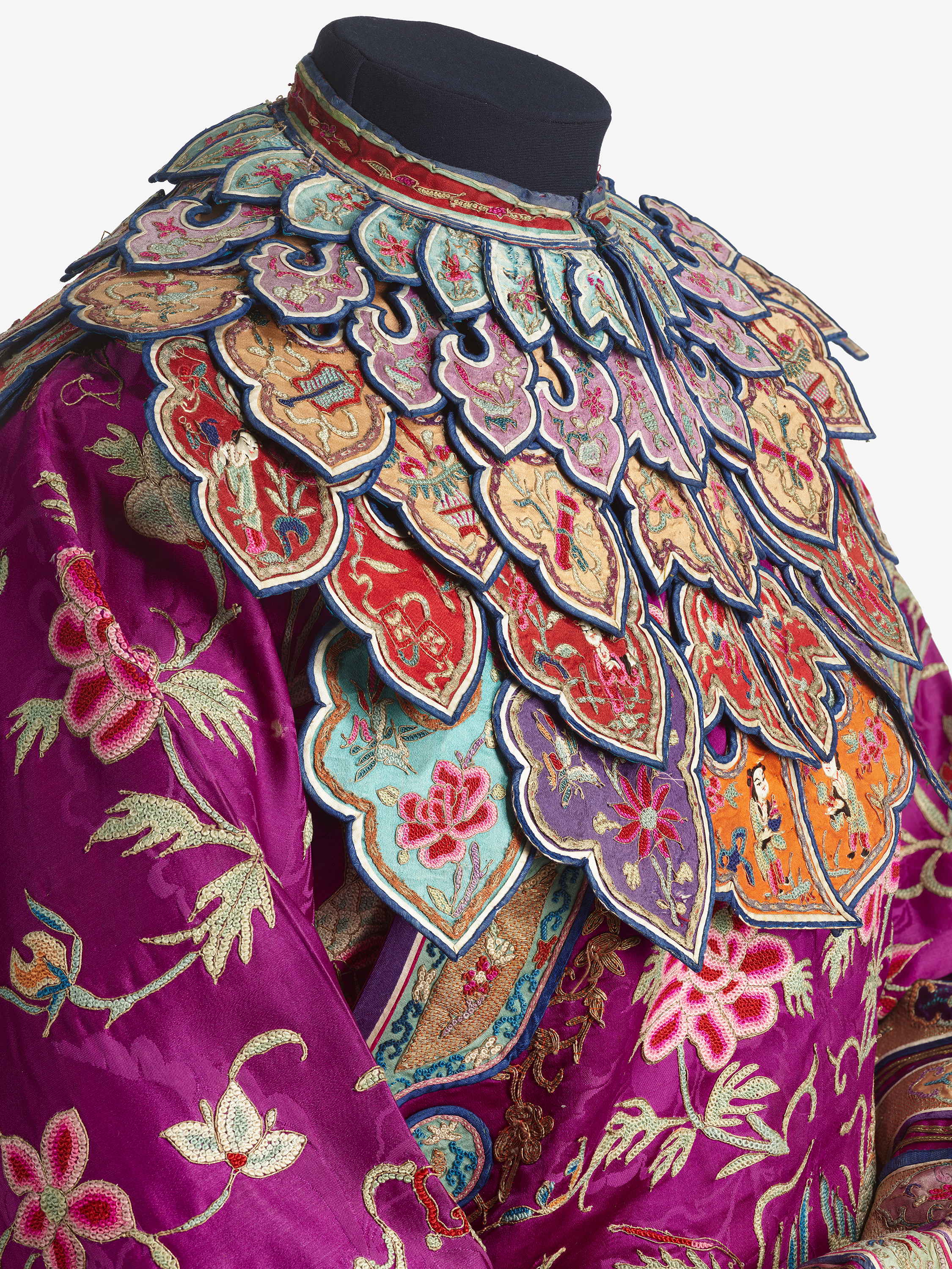 Closeup of an embroidered silk ensemble