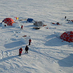 Photo of a camp set up on frozen ground
