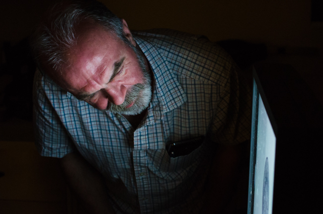 ROM Natural History technical Brad Millen peers at a digital x-ray image of a passenger pigeon egg