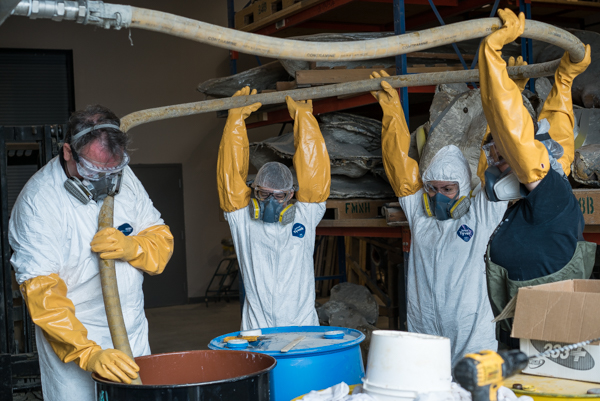 ROM research technicians Oliver Haddrath and Jacqueline Miller work with two ROM Biodiversity volunteers to drain the last of the formalin from the heart tank. Photo by Stacey Lee Kerr