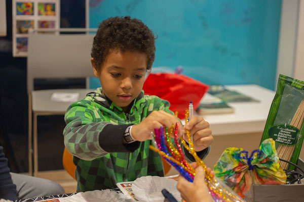 Photo by Karissa Chandrakate @pangea1010 A child at the Hospital for Sick children enjoys a craft