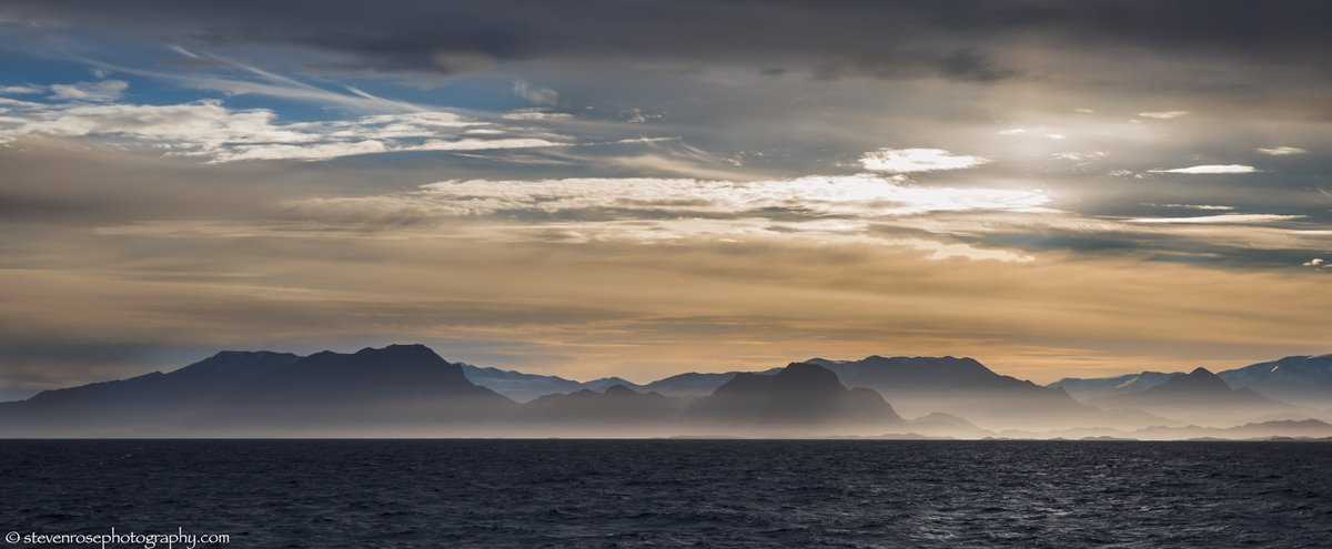 1st cruising along the coast of Greenland the sun had gone down leaving us with a beautiful misty landscape.