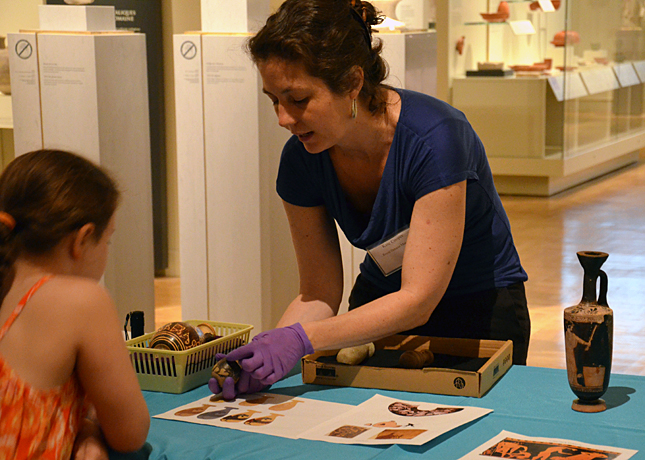 the ROM's Kate Cooper talking Greek pottery techniques in the galleries