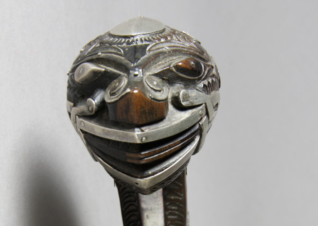 The tenegre from Visaya and Luzon have strange heads, variously described as lions, bats, or deities. Detail of 19th century sword #909.64.22  (photo by Rosalie Villanueva).