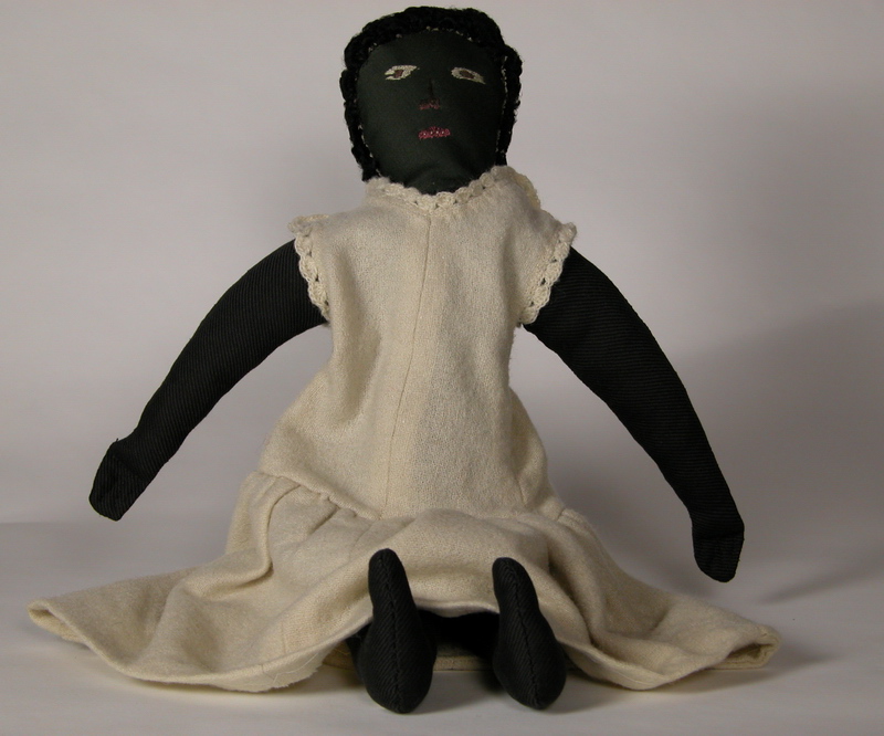 image of a Black folk doll
