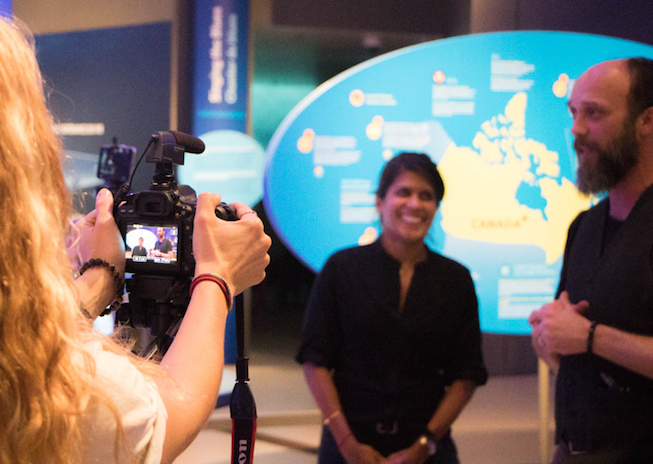 Asha de Vos and Dave Ireland are interviewed at the Out of the Depths: The Blue Whale Story Exhibit in May, 2017. Photo Credit: Meghan Callon Asha de Vos and Dave Ireland are interviewed at the Out of the Depths: The Blue Whale Story Exhibit in May, 2017. Photo Credit: Meghan Callon