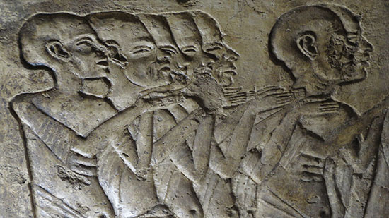 Wall relief depicting human figures. 