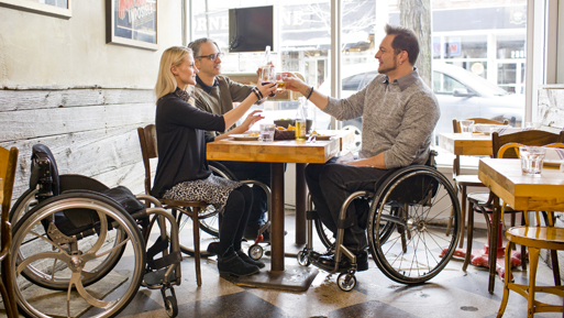 Three people around a table