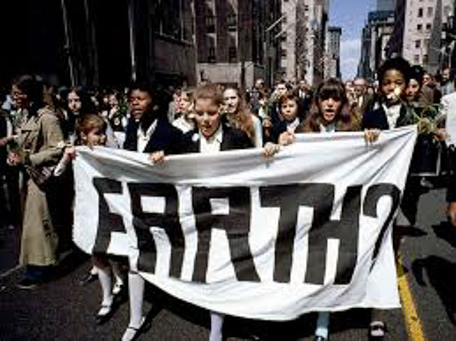 Children marching in protest during the first Earth Day in 1970. Photo by Paul Fusco