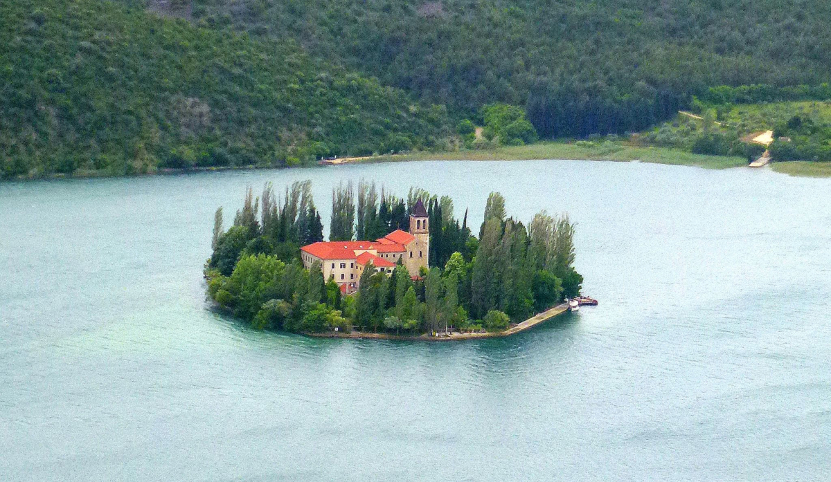 A stone building on an island.
