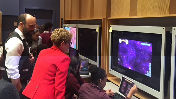 Ontario Premiere Kathleen Wynne drops by the Schad Gallery during students' play-testing of games from ROM Game Jam 2015