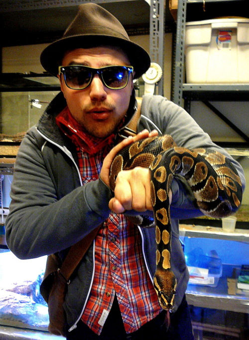 Kiron holding a snake