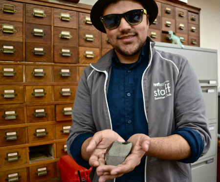 Be like me and hold a piece of Mars! Kiron holds a rock from Mars!