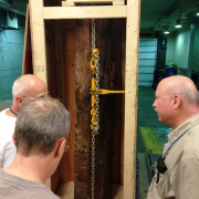 ROM Curator David Rudkin (L) and Technicians Peter Fenton (C), Brian Iwama (R) inspect the new acquisition