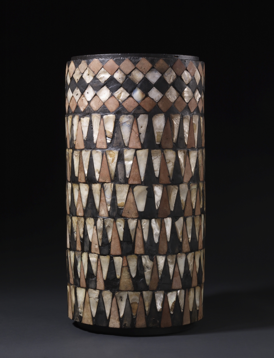 Mosaic column drum - Shell, pink limestone, and black shale c. 2500 BC From Tell al-‘Ubaid, Ninhursag Temple H 59cm, Diam. 31cm  BM 115328 © The Trustees of the British Museum 