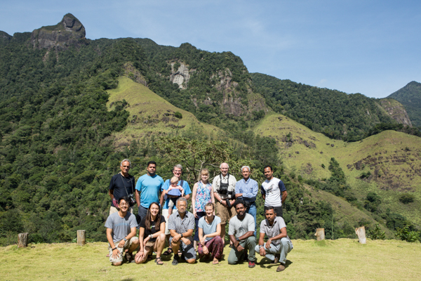 The entire ROM Sri Lanka team poses in front of the Knuckles Mountain Range