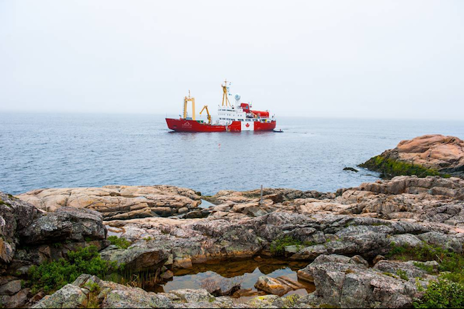 A photo of the Polar Prince: Canada C3's expedition vessel sitting offshore in Les Escoumis, Quebec. Photo credit: Mike Sudoma