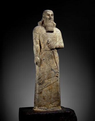    Statue of Ashurnasirpal II -  Magnesite. Nimrud, northern Iraq,  Neo-Assyrian  875 - 860 BCE BM 118871    © The Trustees of the British Museum.        