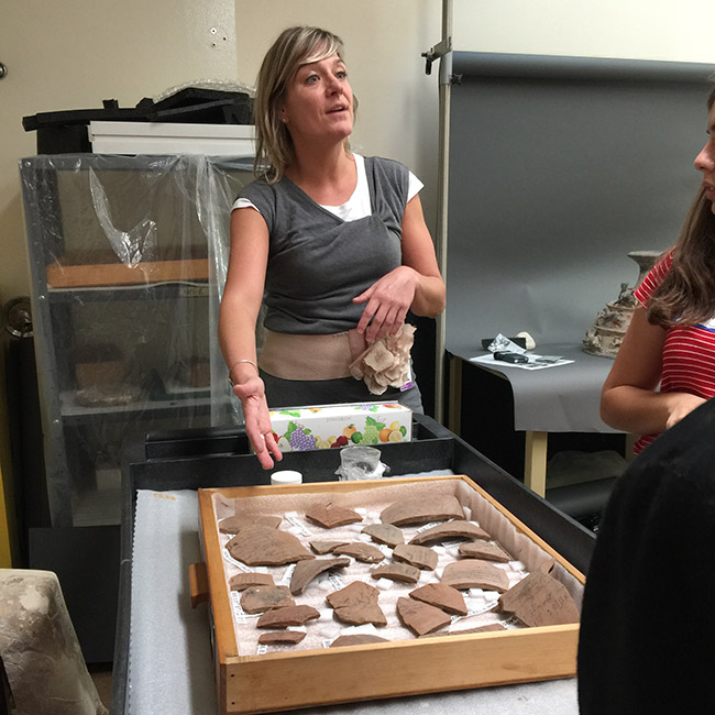 In the conservation studio with Laura Lipscei, students learn how the Museum conserves its collections.