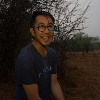 Vincent Luk, wildlife photographer, soaked from shooting in a rainstorm while in Sri Lanka