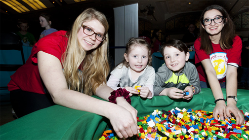 ROM volunteers with kids during March Break