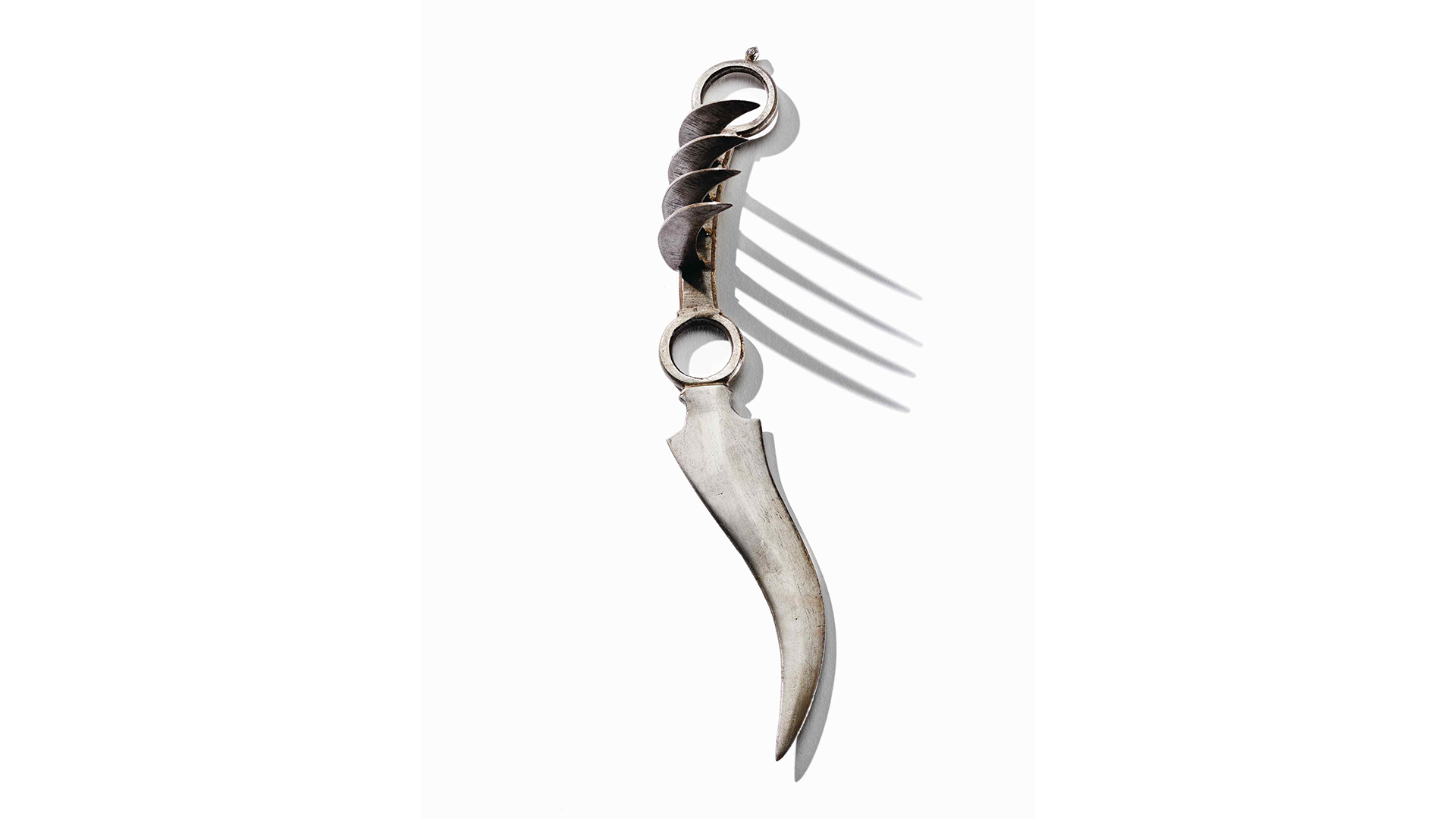 Steel dagger with handle shaped like tiger claws