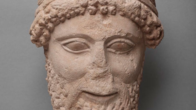 Detail of Cypriot limestone sculpture of head, dating to 5th century BC.